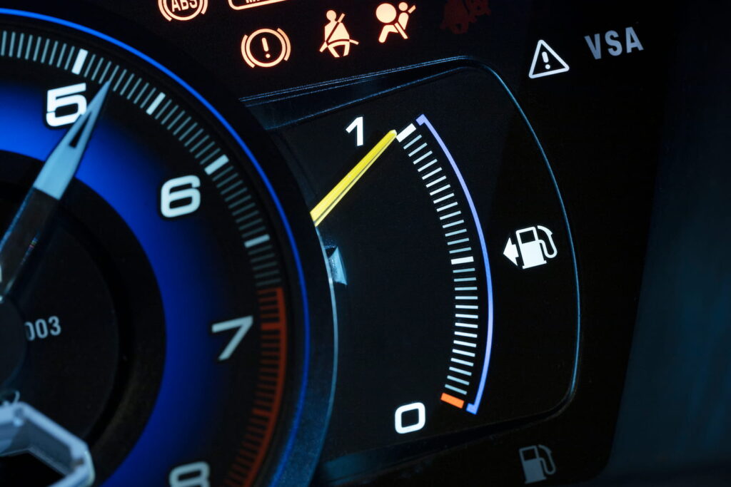 Close up fuel level gauge vehicle 1080